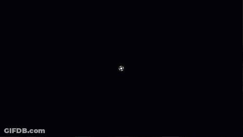 A Black Background With White Circles And Squares GIF