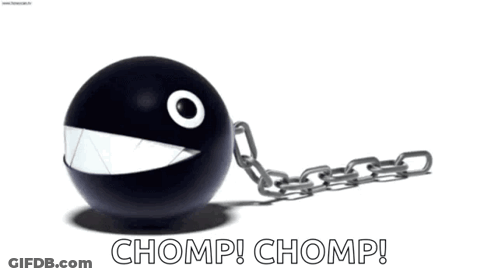 A Black Ball With A Chain Around It That Says Chomp Chomp GIF
