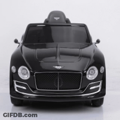 A Black Bentley Toy Car Is Sitting On A White Table GIF