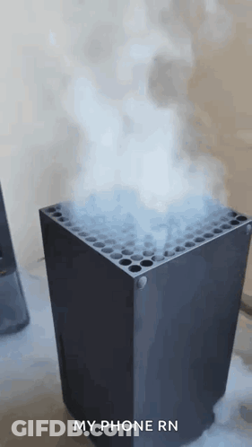 A Black Box With Smoke Coming Out Of It And The Words `` My Phone Rn '' Written On The Bottom . GIF