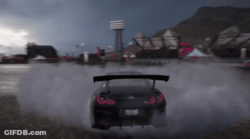 A Black Car With A License Plate That Says ' Jc ' On It GIF
