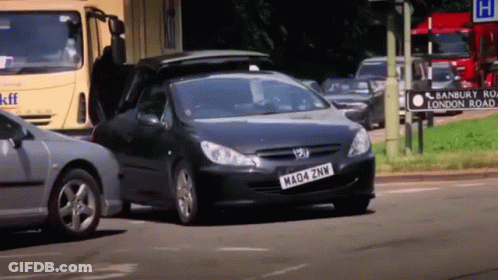 A Black Car With A License Plate That Says Mad4 Znw GIF