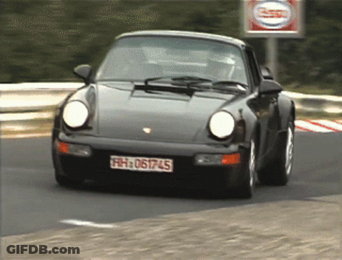 A Black Car With The License Plate Fh 061745 GIF