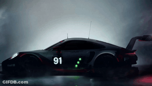 A Black Car With The Number 91 On It GIF