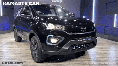 A Black Car With The Word Namaste Car On The Top GIF