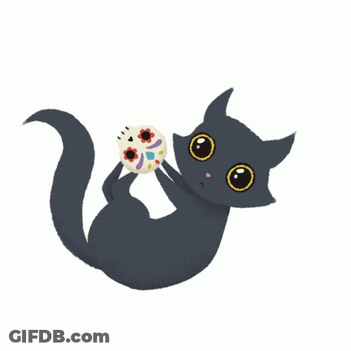 A Black Cat Is Playing With A Sugar Skull Cookie GIF