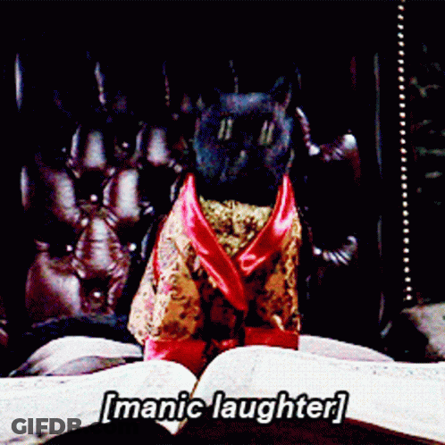 A Black Cat Wearing A Robe Is Sitting On A Book With The Words I Manic Laughter Written Below It GIF
