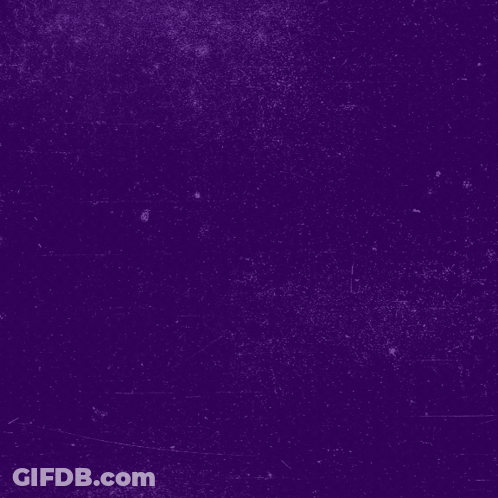 A Black Cat With White Eyes Is Surrounded By Black Triangles GIF