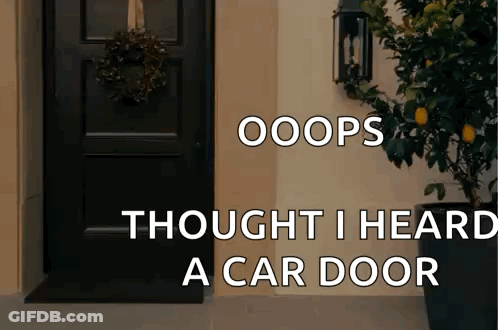 A Black Door With A Wreath On It And The Words Oops Thought I Heard A Car Door Below It GIF