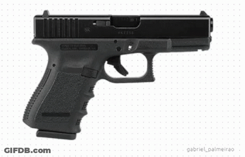 A Black Glock 19 Pistol Is Sitting On A White Surface GIF