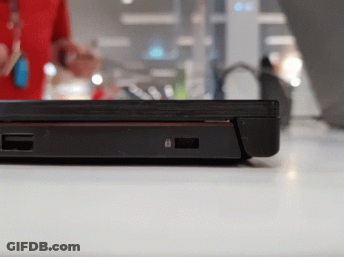 A Black Laptop With A Padlock On The Side Of It GIF