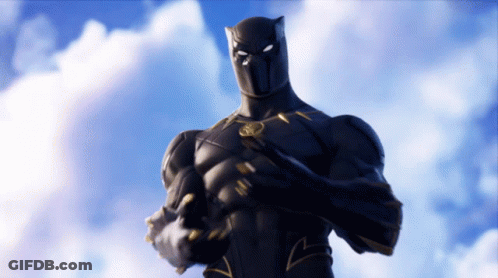 A Black Panther Standing In Front Of A Blue Sky GIF