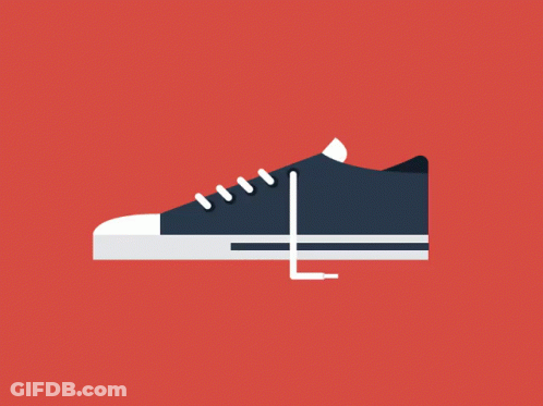 A Black Shoe With White Laces On A Red Background . GIF