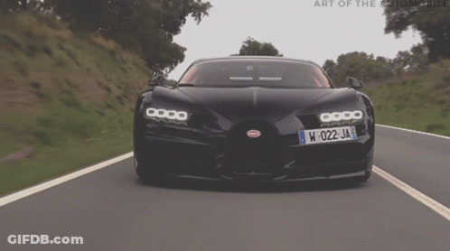 A Black Sports Car With A License Plate That Says W-022 Ja GIF