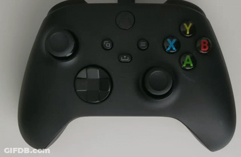 A Black Xbox Controller With A White X In The Center GIF
