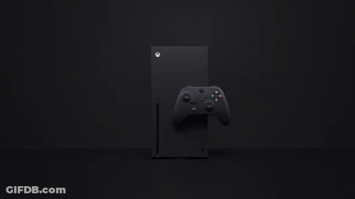 A Black Xbox Series X Console With A Black Controller On A Black Background . GIF