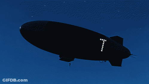 A Black Zeppelin With The Word He Mor Written On It GIF