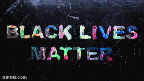 A Blackboard With The Words " Black Lives Matter " Painted In Different Colors GIF