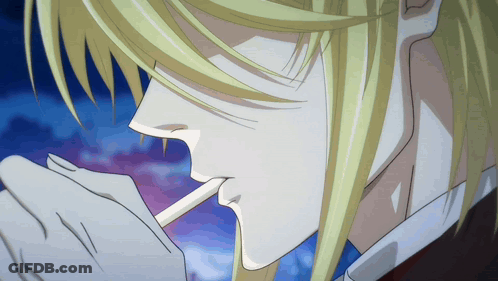 A Blonde Anime Character Is Smoking A Cigarette GIF