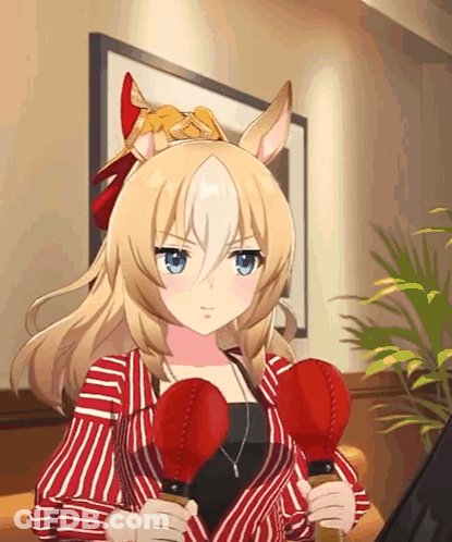 A Blonde Anime Girl Is Holding Two Red Boxing Gloves In Her Hands GIF