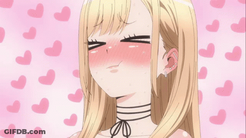 A Blonde Anime Girl Is Making A Funny Face With Her Mouth Open GIF