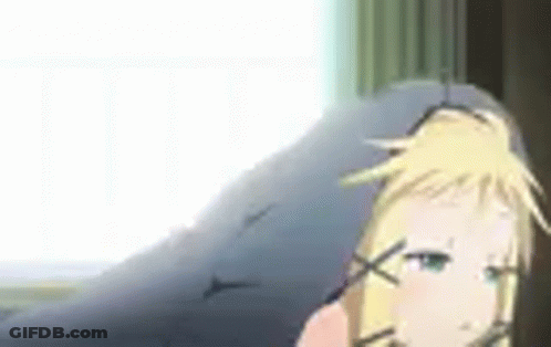 A Blonde Anime Girl Is Sitting On A Couch Looking Out A Window . GIF