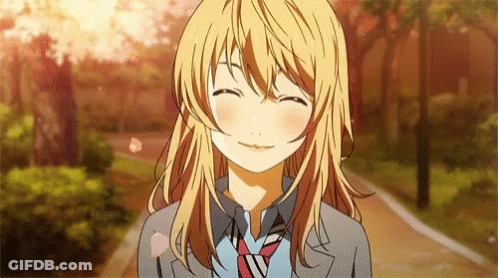 A Blonde Anime Girl With Long Hair And A Tie Is Smiling . GIF