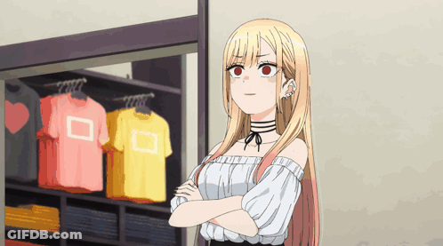 A Blonde Anime Girl With Red Eyes Is Standing In Front Of A Closet With Shirts Hanging On It GIF