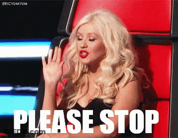 A Blonde Woman Is Sitting In A Red Chair With The Words Please Stop Written On It GIF