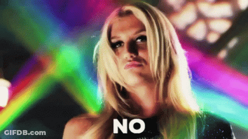 A Blonde Woman Is Standing In Front Of A Colorful Background And Says No . GIF