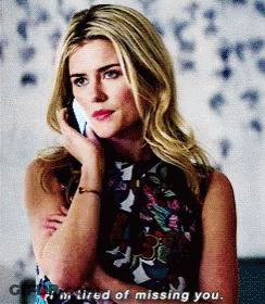 A Blonde Woman Is Talking On A Cell Phone And Says I 'M Tired Of Missing You GIF