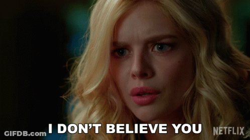 A Blonde Woman Says " I Don 'T Believe You " In Front Of A Netflix Logo GIF