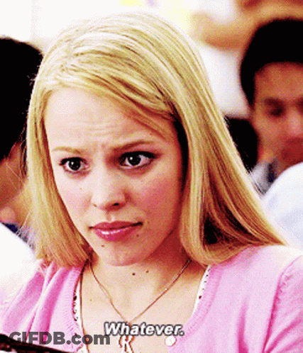 A Blonde Woman Wearing A Pink Sweater And Necklace Says Whatever GIF