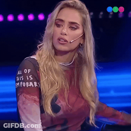 A Blonde Woman Wearing A Shirt That Says All Of This Is Emporar GIF