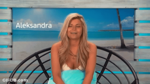 A Blonde Woman With The Name Aleksandra On The Bottom Right GIF