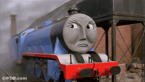 A Blue And Red Train With A Face That Says I On It GIF