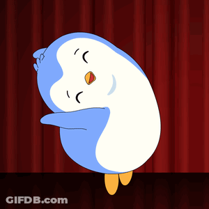 A Blue And White Penguin Is Dancing On A Stage GIF