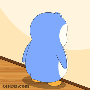 A Blue And White Penguin Standing Next To A Wall GIF