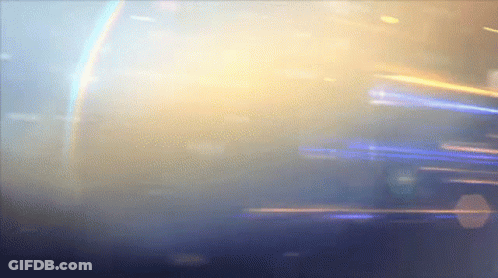 A Blue And Yellow Background With A Rainbow In The Background GIF