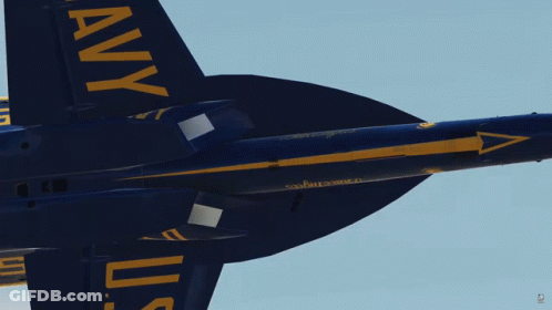 A Blue And Yellow Fighter Jet With The Letters Uss On The Tail GIF