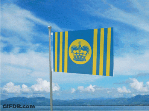 A Blue And Yellow Flag That Says ' Hawaii ' On It Is Flying In The Wind GIF