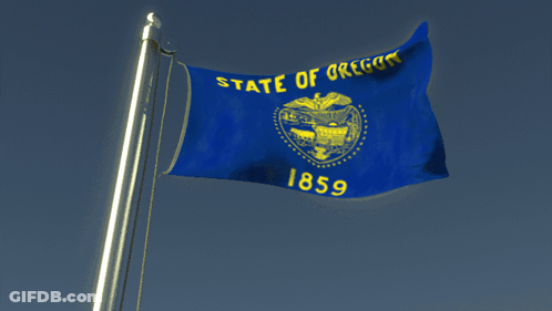 A Blue And Yellow Flag That Says State Of Oregon GIF