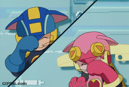 A Blue And Yellow Robot And A Pink And Yellow Robot Are Fighting GIF