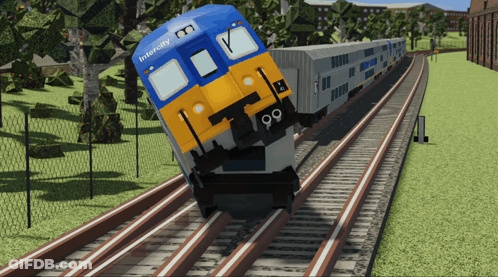 A Blue And Yellow Train With The Number 99 On The Front GIF