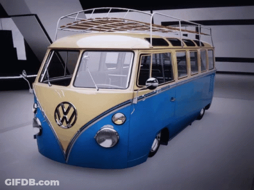A Blue And Yellow Vw Van With A Roof Rack GIF
