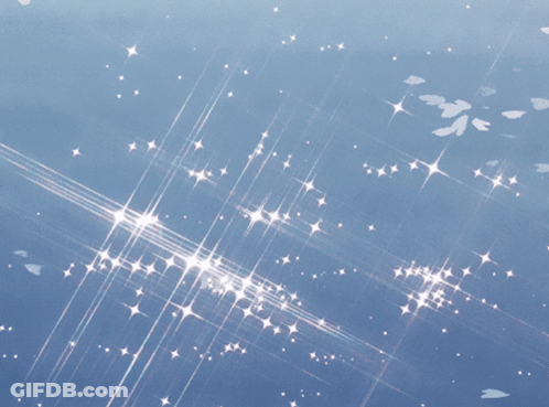 A Blue Background With A Lot Of Stars Shining On It GIF