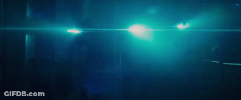A Blue Background With A White Arrow Pointing Up GIF