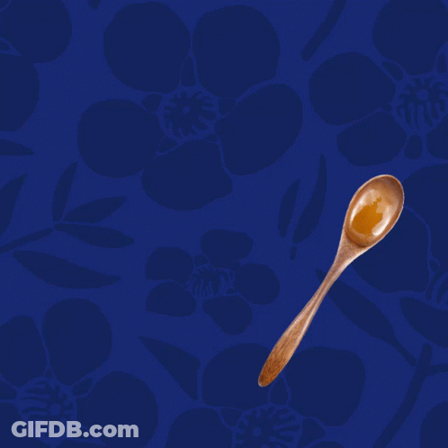 A Blue Background With A Wooden Spoon And The Words " One Spoon A Day " GIF