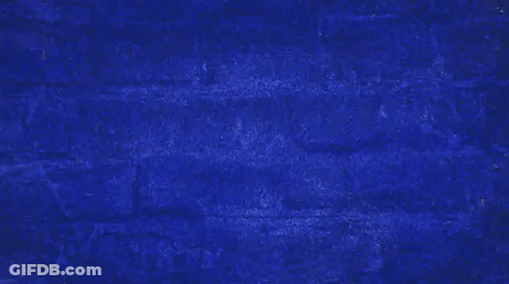 A Blue Background With The Words `` Touchdown '' Written On It . GIF