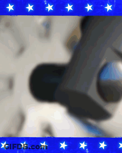 A Blue Background With White Stars And A Blurred Image Of A Person GIF
